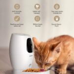 smart pet camera dispensing a treat to a cat while owner watches via app