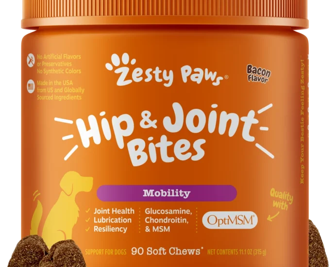 Zesty Paws hip and joint supplement soft chews spilled next to the jar